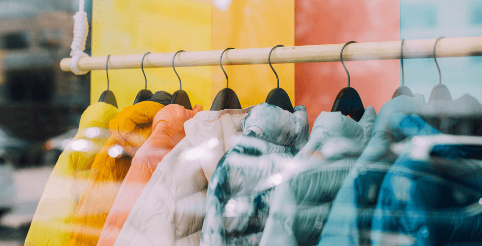 rack of colorful winter coats 