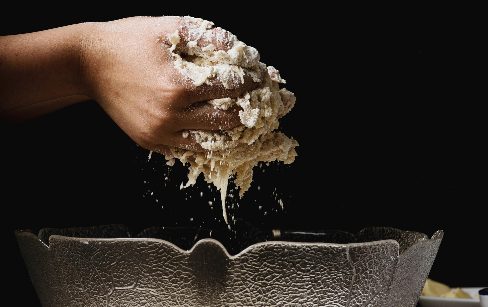 shaping dough by hand 