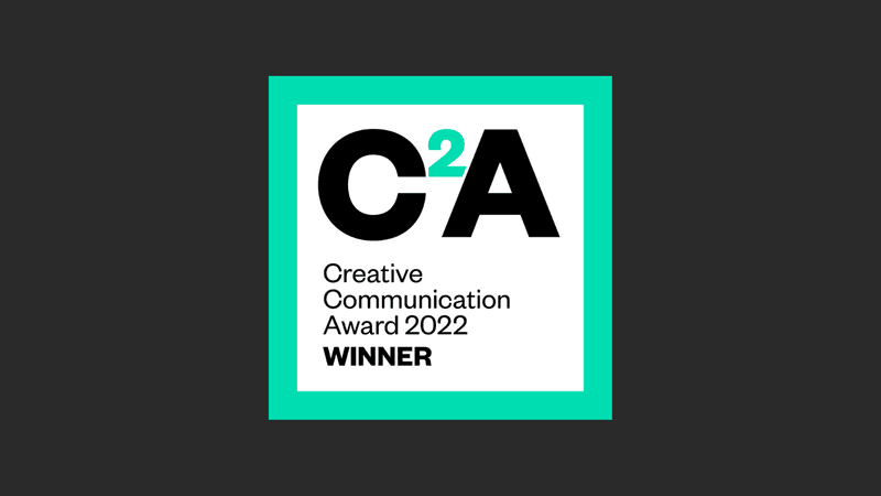 C2A Awards square logo with teal outline on a black background 