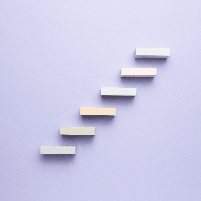 Stairs block on purple background 