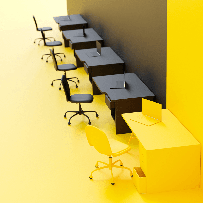 row of desks and chairs, 4 black and 1 yellow