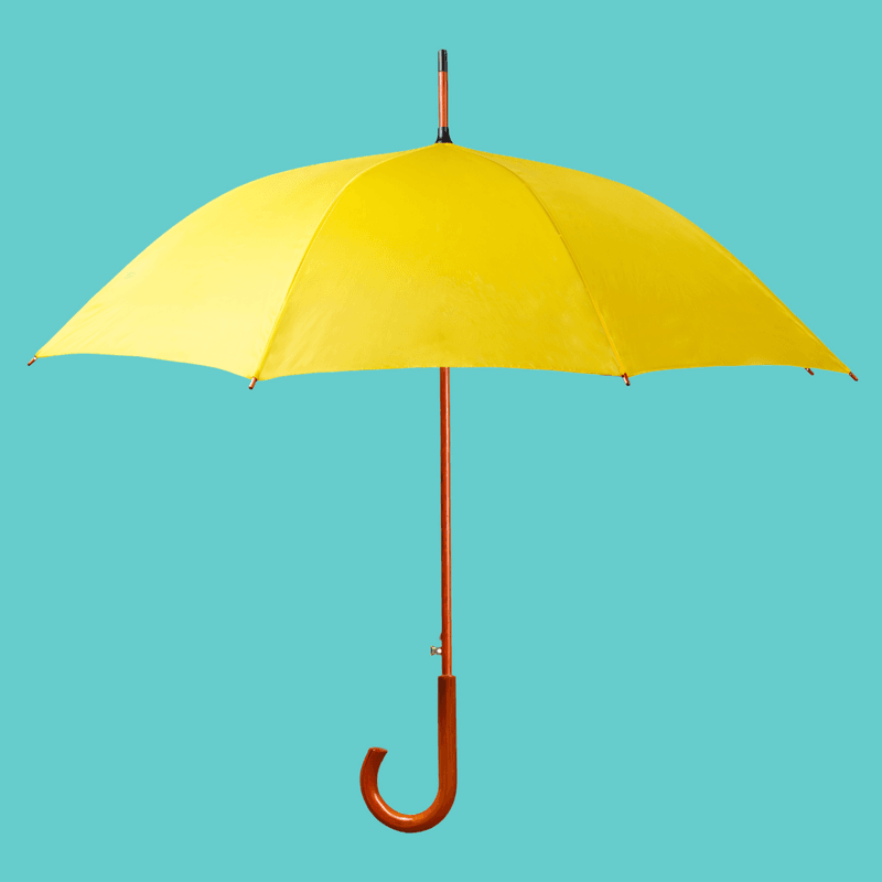 yellow umbrella on a teal background