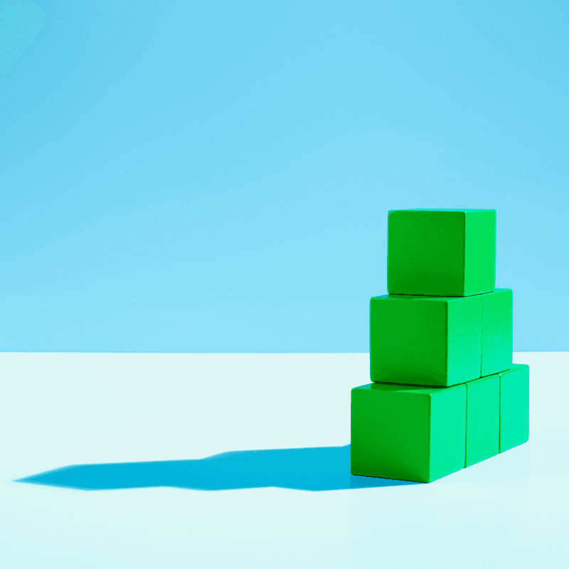 stack of green blocks 